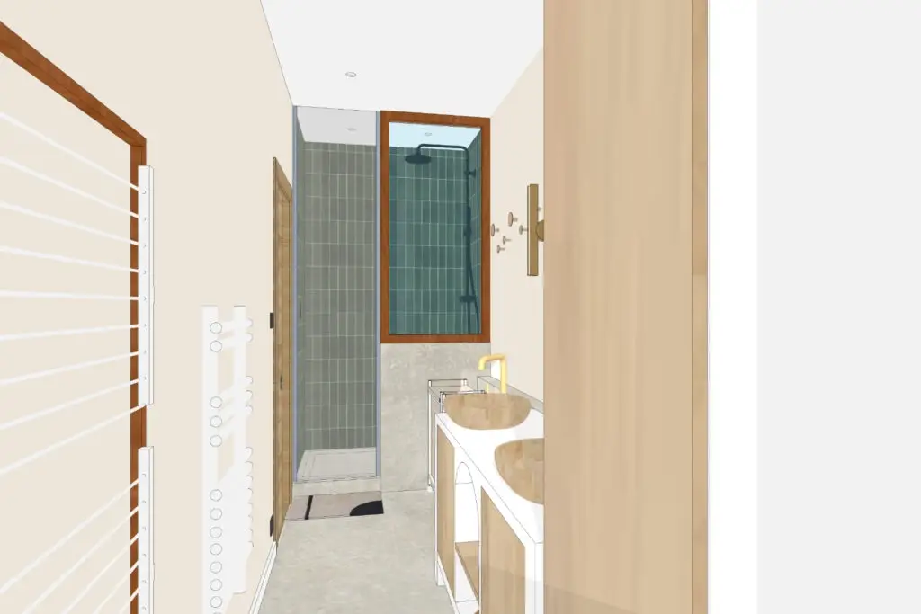 Salle d’eau rénovée avec douche carrelée et double vasque, appartement 70 m² à Eaubonne